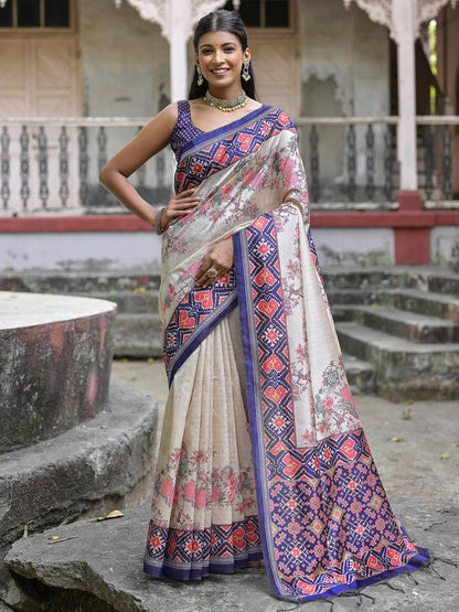 Soft Tussar Silk with Patola Print on Pallu with Floral Jal  on body.