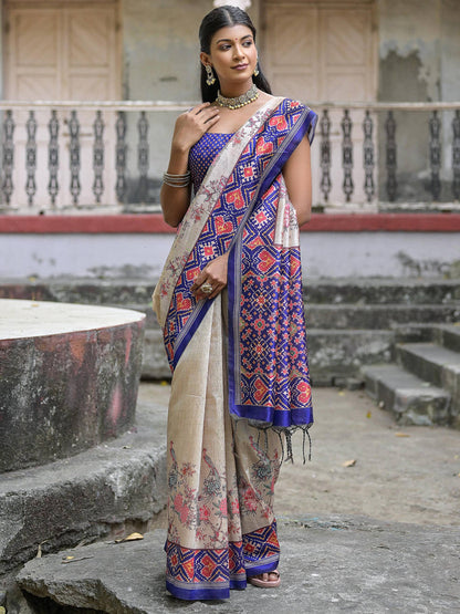 Soft Tussar Silk with Patola Print on Pallu with Floral Jal  on body.