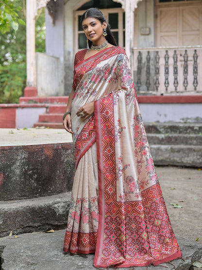 Soft Tussar Silk with Patola Print on Pallu with Floral Jal  on body.