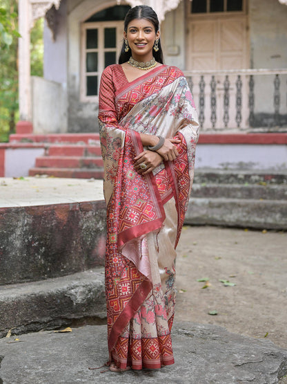 Soft Tussar Silk with Patola Print on Pallu with Floral Jal  on body.