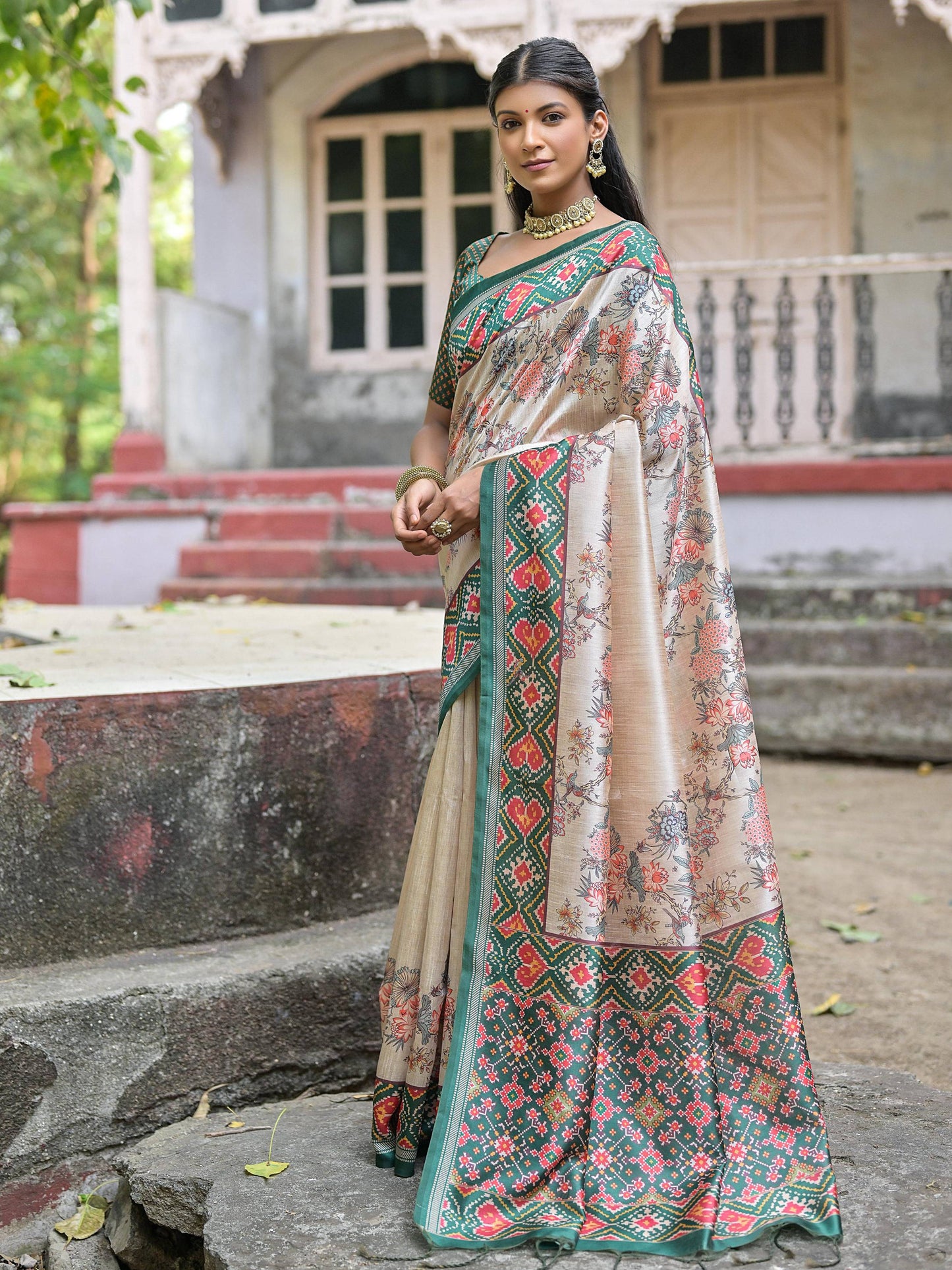 Soft Tussar Silk with Patola Print on Pallu with Floral Jal  on body.