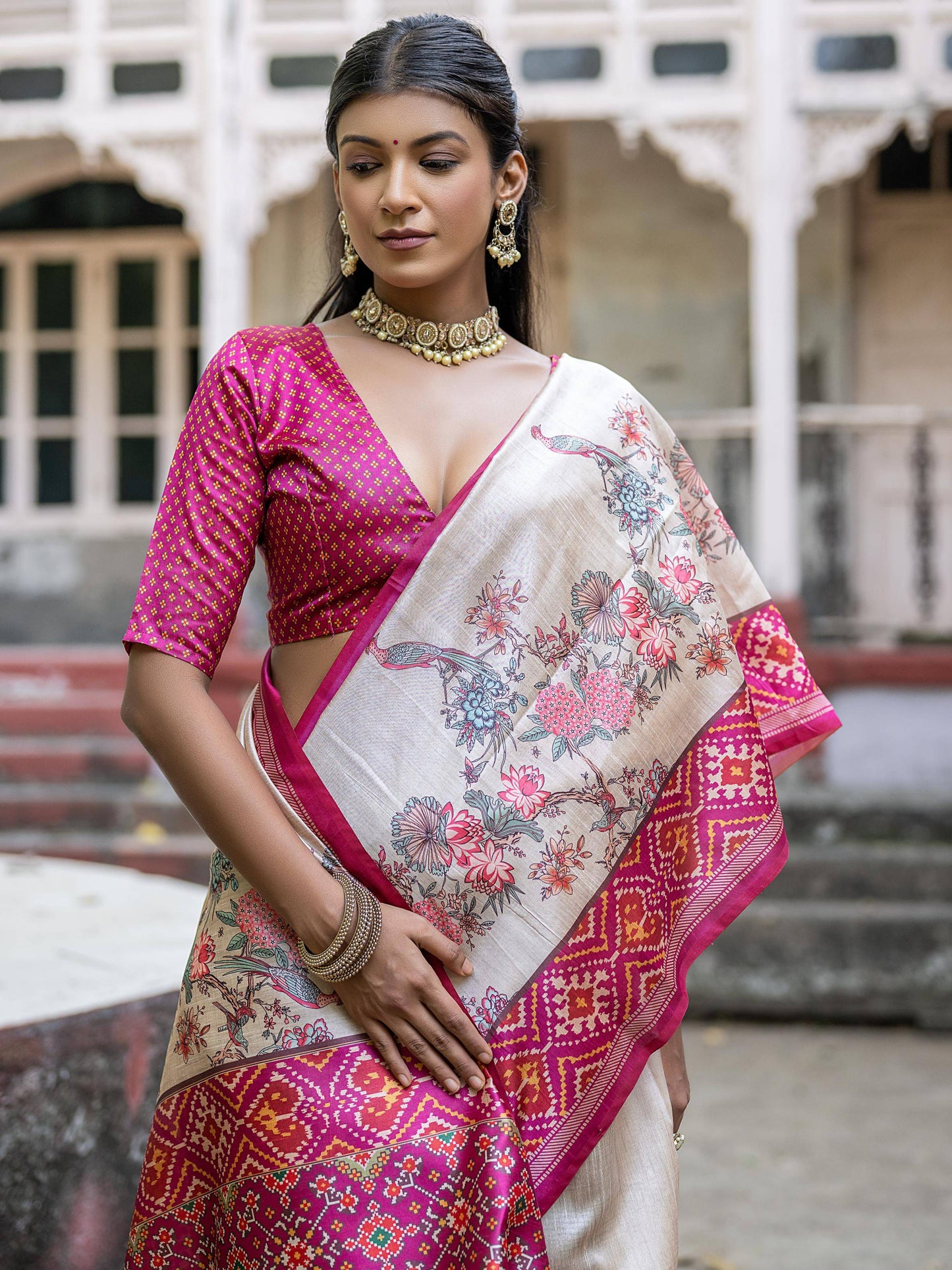 Soft Tussar Silk with Patola Print on Pallu with Floral Jal  on body.