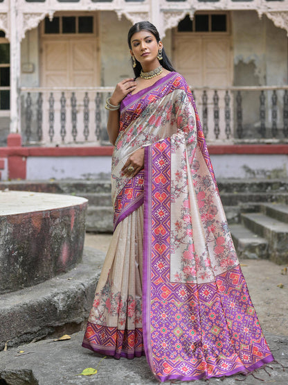 Soft Tussar Silk with Patola Print on Pallu with Floral Jal  on body.